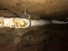 NCT Plumbing fixing pipes below North Richland Hills home